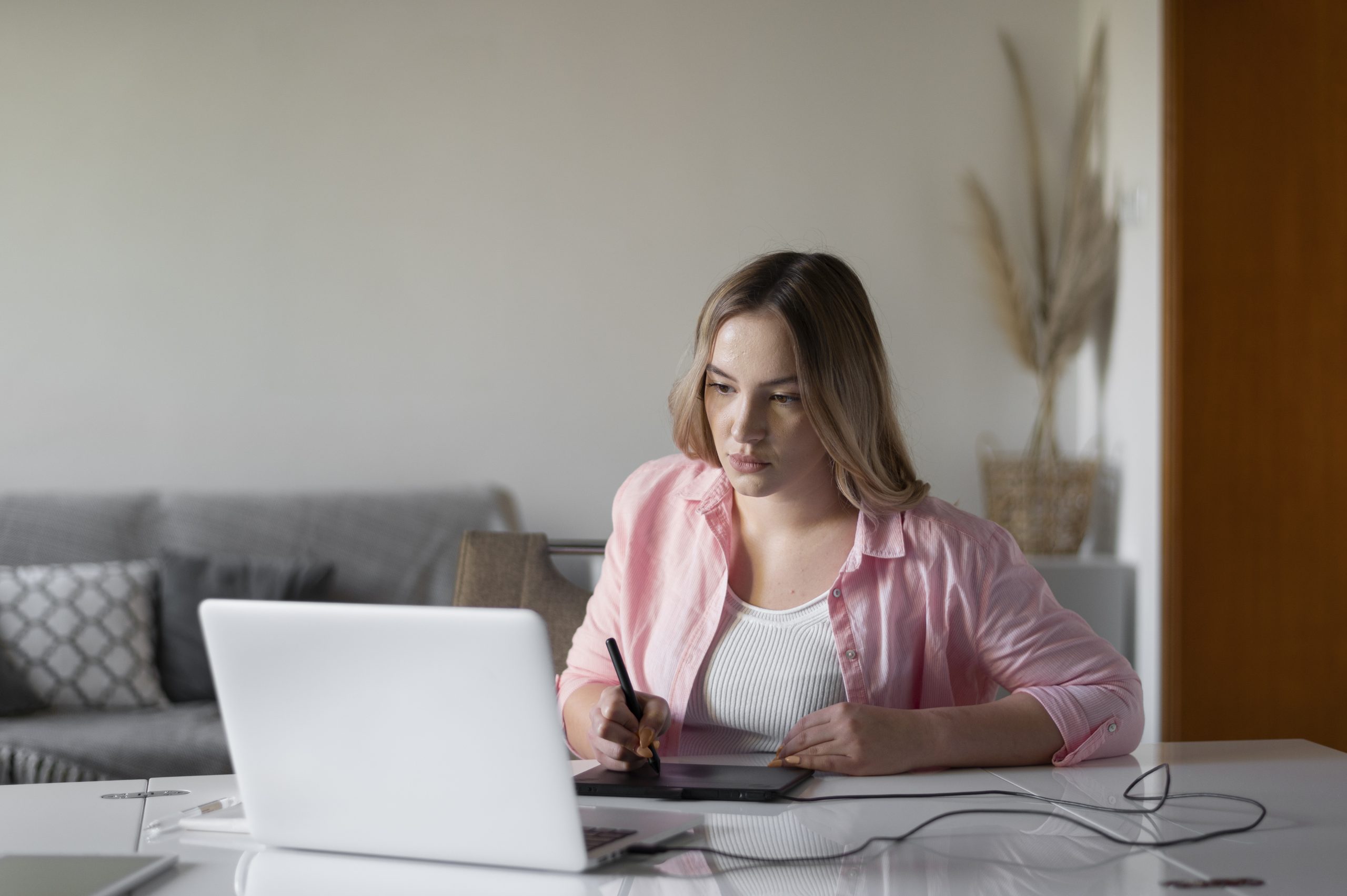 medium-shot-woman-using-graphic-tablet-scaled